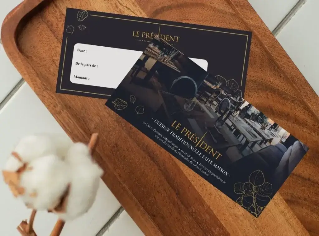 Carte cadeau Le Président, cuisine traditionnelle faite maison, posée sur un plateau en bois